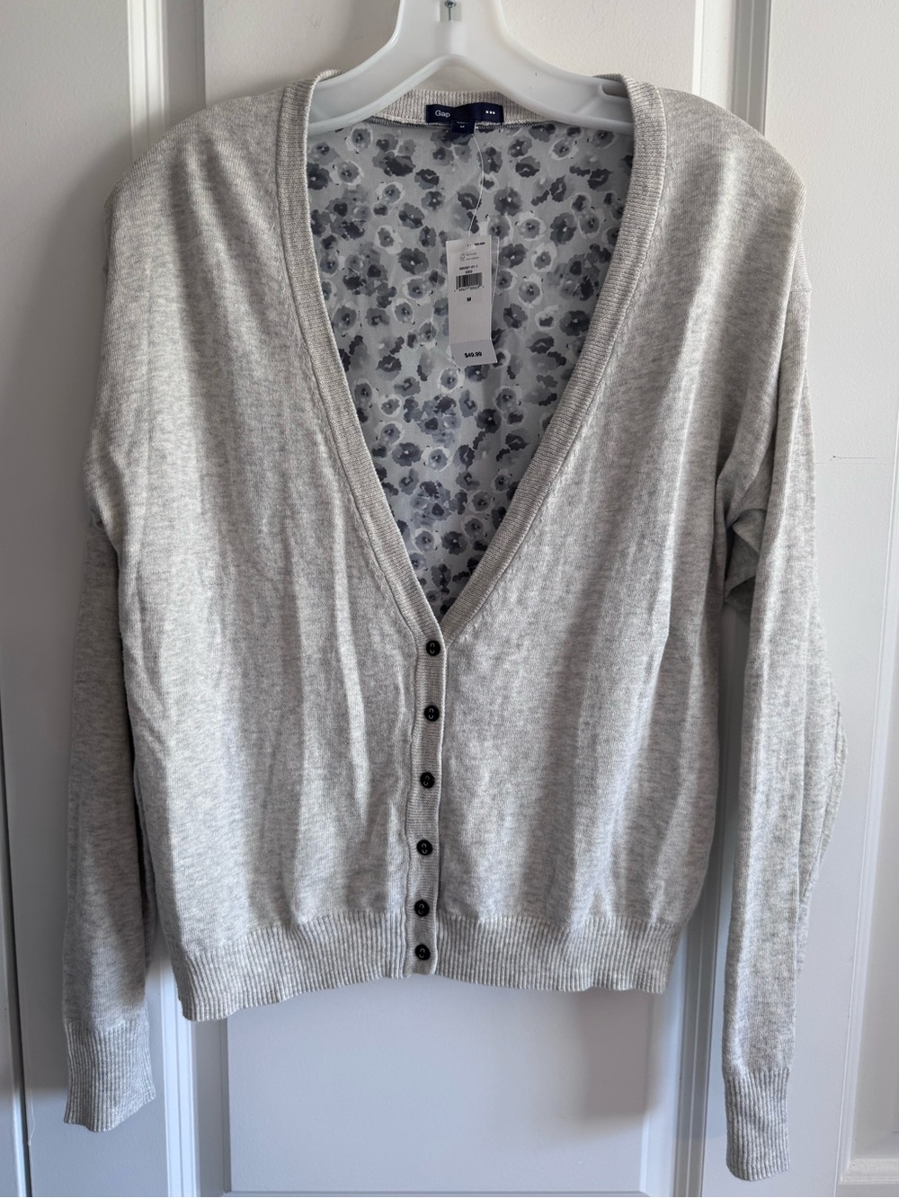 Gap Cardigan features a Heather gray knit front with a sheer floral pattern back